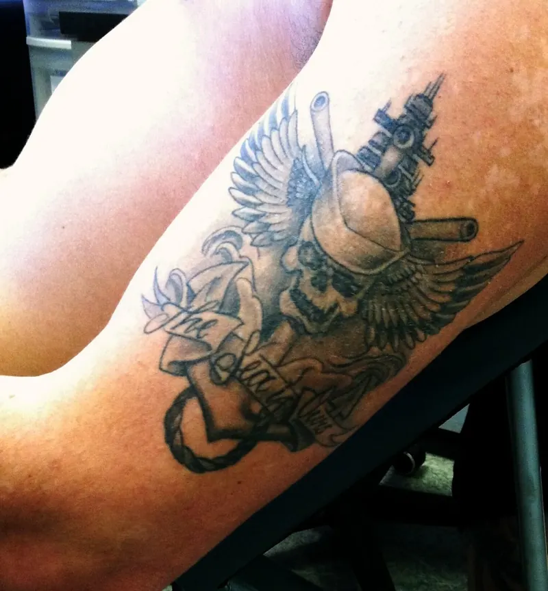 Winged tattoo on an arm