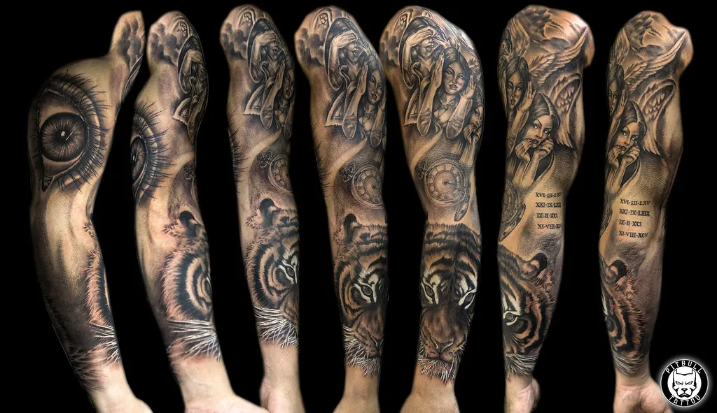 Row of black and grey tattoo sleeves